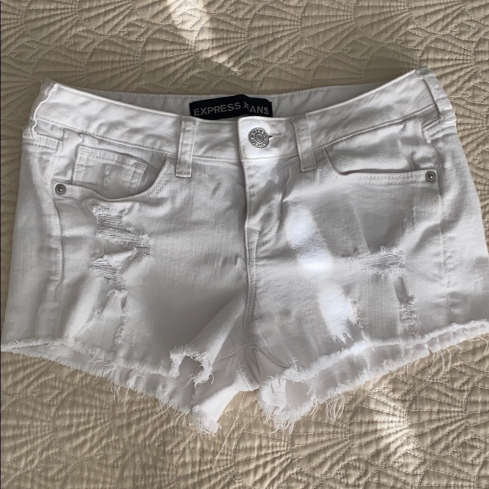 Distressed Express shorts. Has stretch!